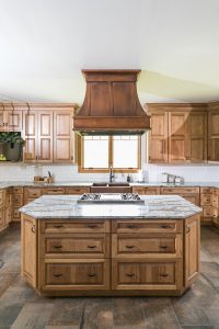 kitchen remodel with brown wooden cabinets