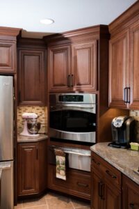 Cherry cabinets with stainless steel appliances