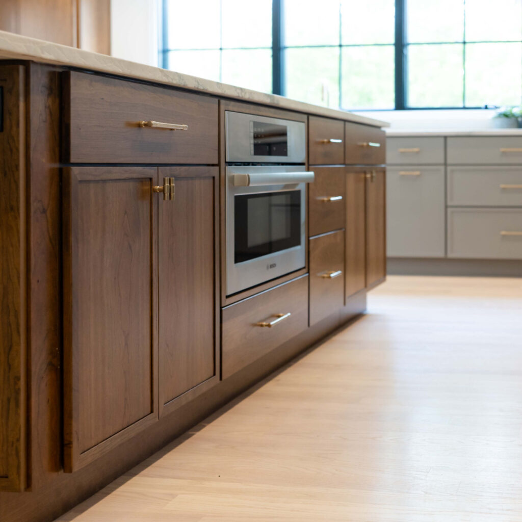 Close up shot of brown framed cabinets in a kitchen island