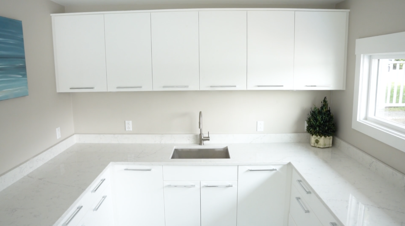 White outdoor cabinetry by Open Air Cabinetry