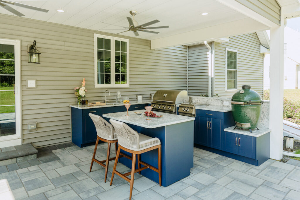 Blue outdoor cabinets with grill