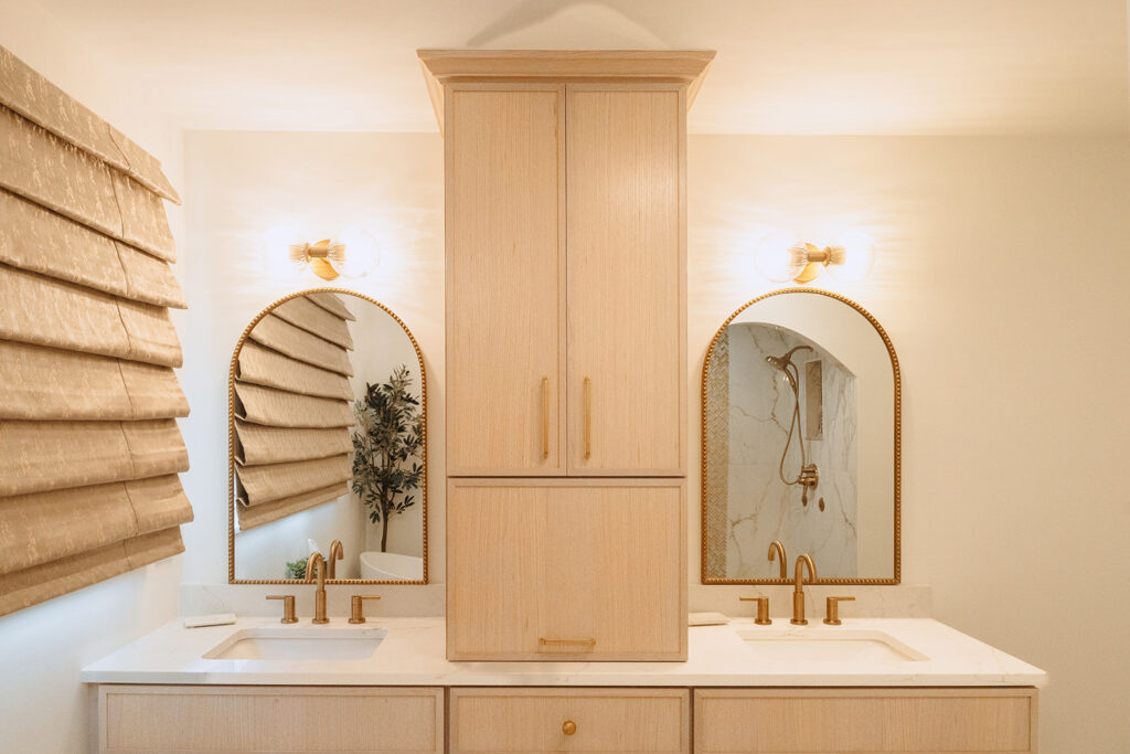 Tall storage cabinet on white oak bathroom vanity