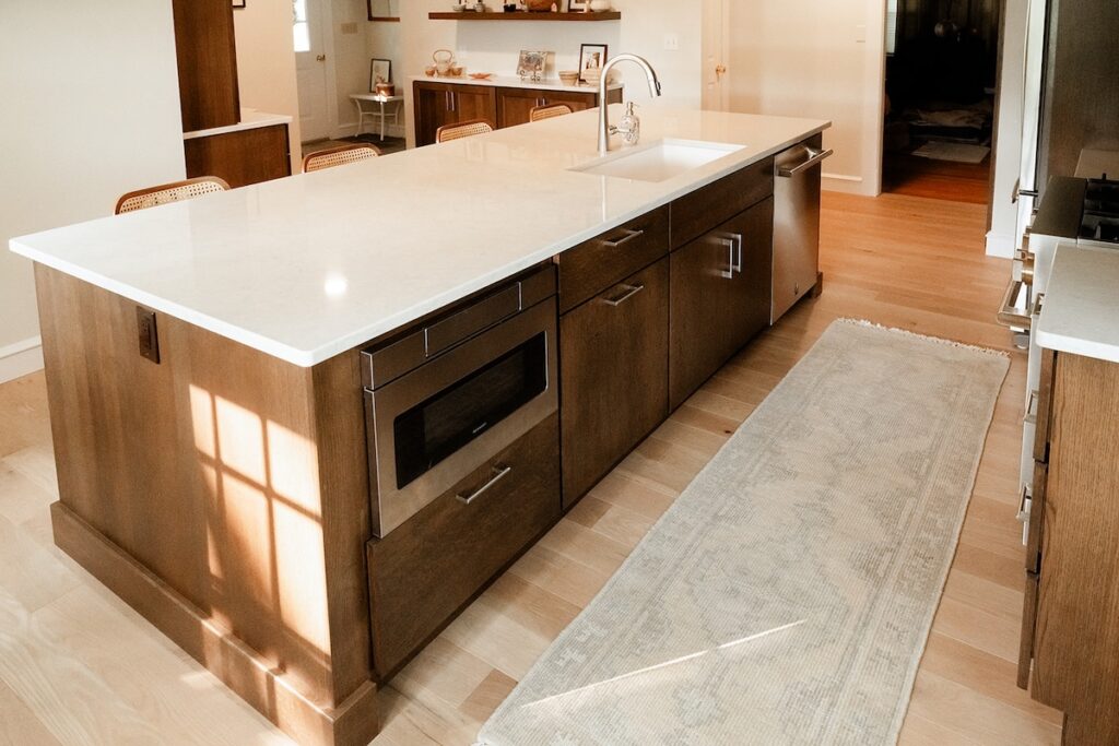 Large island with built in microwave and dishwasher