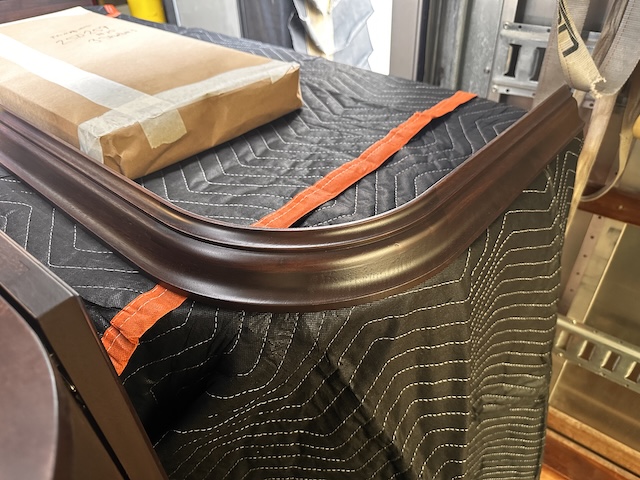 Custom cabinetry wrapped in blankets